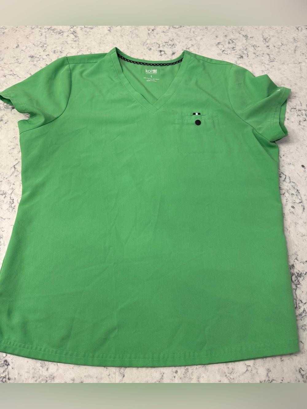 Koi Women’s L V-Neck Scrub Top in Green with black accents. Like new condition
